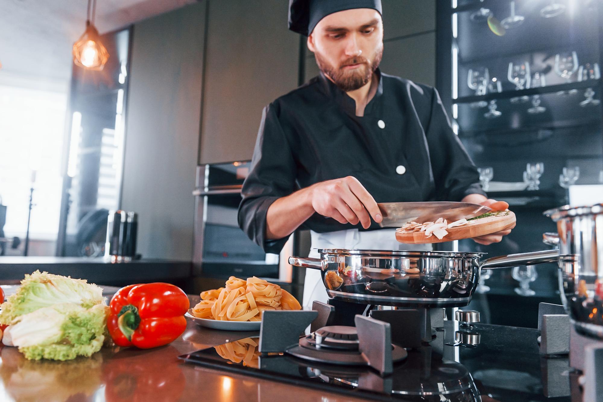Chef at modern workstation with tools